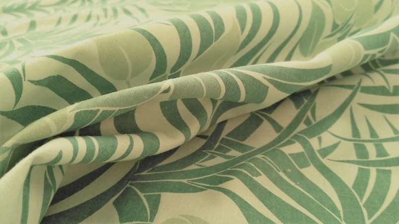 Tessuto per arredamento fantasia jungle con foglie stilizzate - bianco e verde2